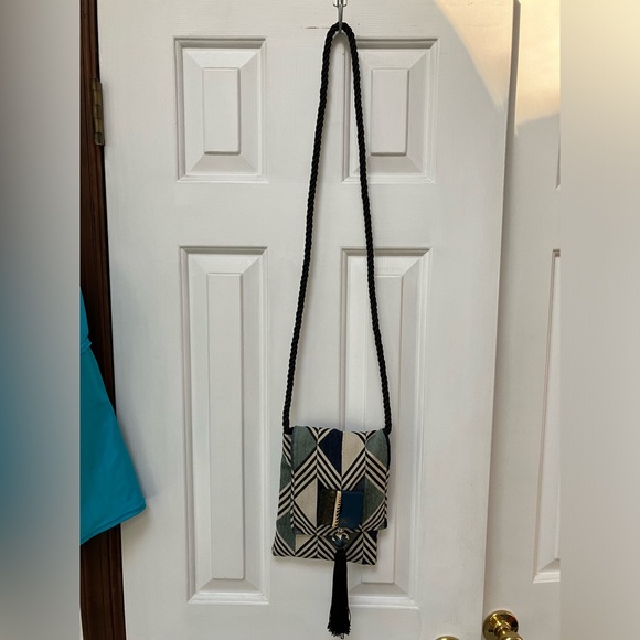 One of a kind fabric, clay, bead, tassel crossbody. Thick black braid-strap. - Picture 4 of 5